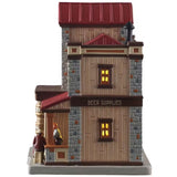 This is the other side of the building. The awning reads "BEER SUPPLIES." There are two windows with light coming through. You can see the bartender standing at the bar and the back of the man sitting on the stool.