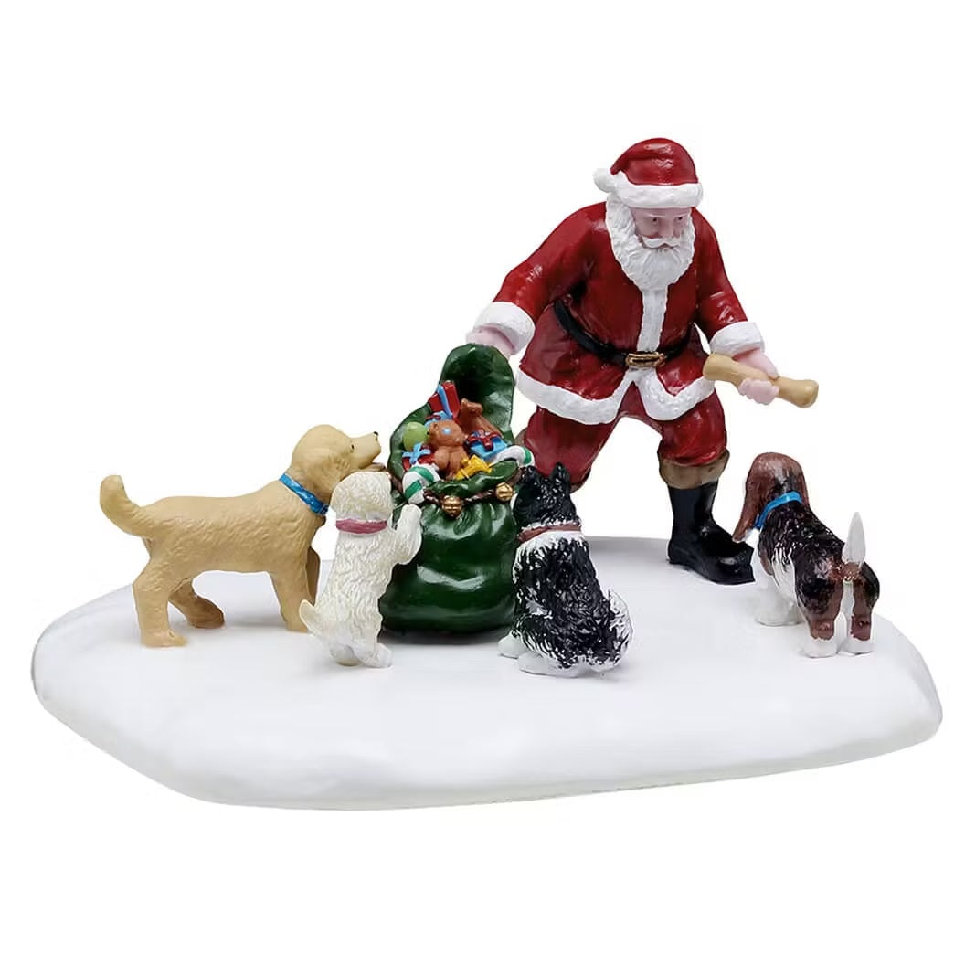 This is a Lemax table accent designed to look like Santa passing out treats and toys to four dogs in the snow.