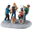 This is a Lemax table accent designed to look like a four people playing instruments and a dog wearing sunglasses. Two people are playing the saxophone and two people are playing the trombone.