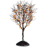This is a Lemax Spooky Town tree that has a twisted trunk, bunches of bare branches and purple lights. This is showing it on a white background.