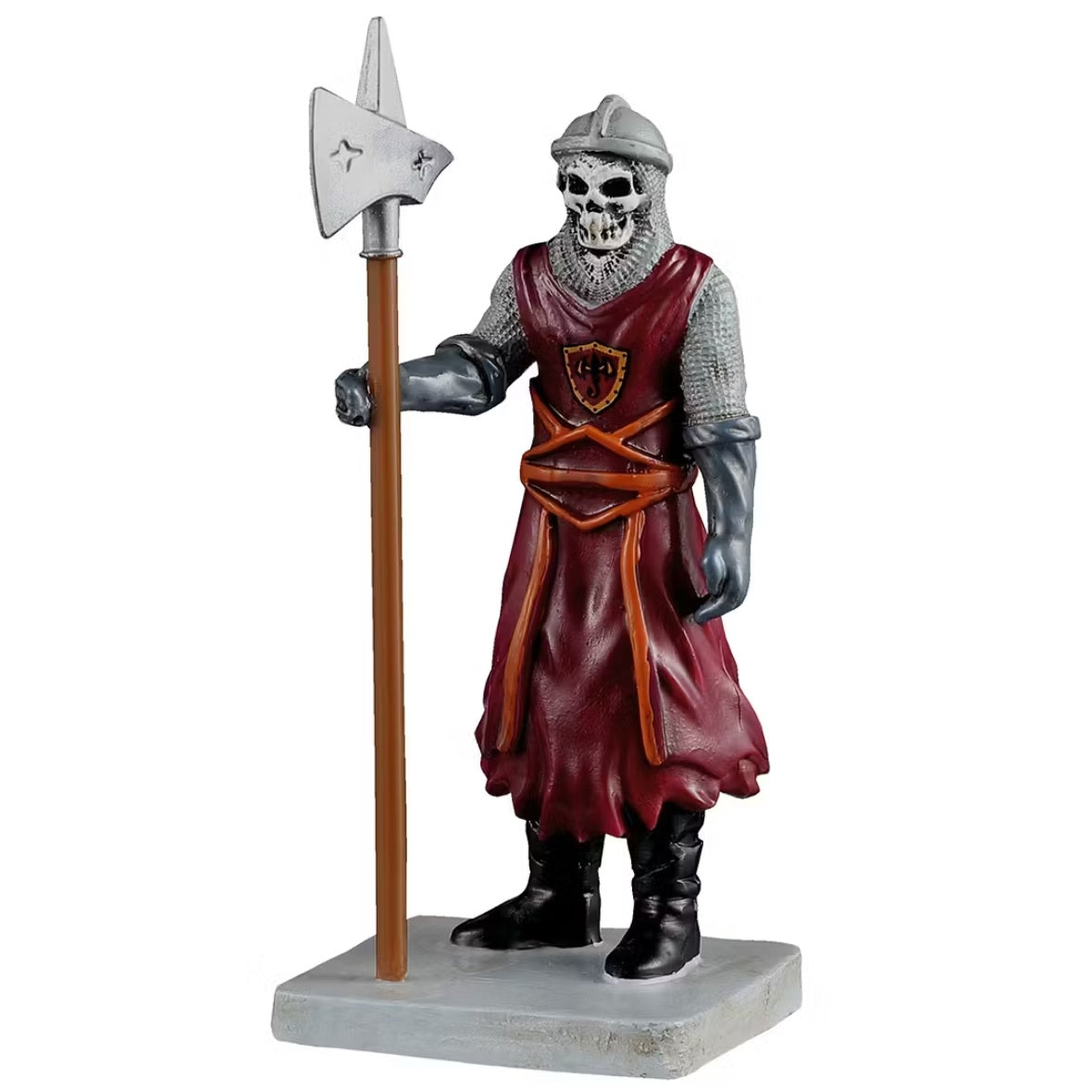 This is a Lemax Spooky Town figurine designed to look like a skeleton wearing armor and a royal red colored uniform. He's holding a tall war hammer.