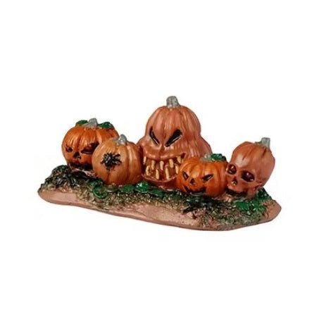 This is a set of five differently carved jack-o-lanterns. There are black spiders all over and the pumpkin faces are really creepy.