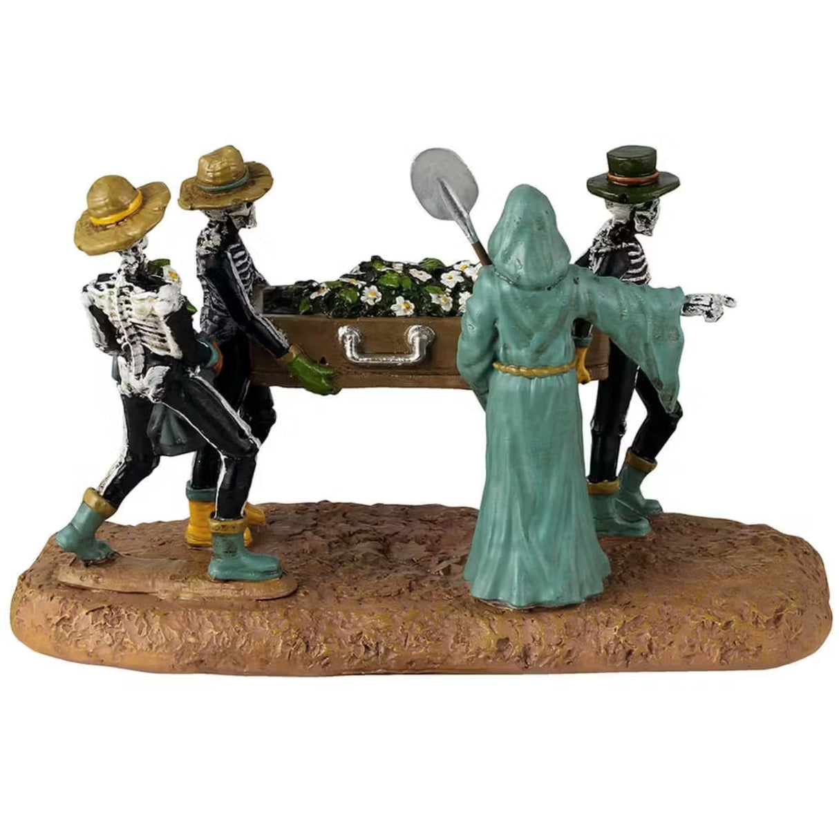 This is a different angle of the Lemax Spooky Town table accent that's designed to look like three skeletons carrying a coffin full of daisies. They're all wearing garden hats and rubber boots. There's a Grim Reaper wearing a teal cloak pointing the way.