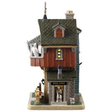This is the other side of this Lemax building. You can see a skeleton sitting on the toilet through an open door near the sidewalk.