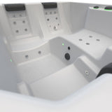 This is an up close view of the seats and jets inside the hot tub.