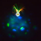 This is a lifestyle image showing the fountain and it's different lights.