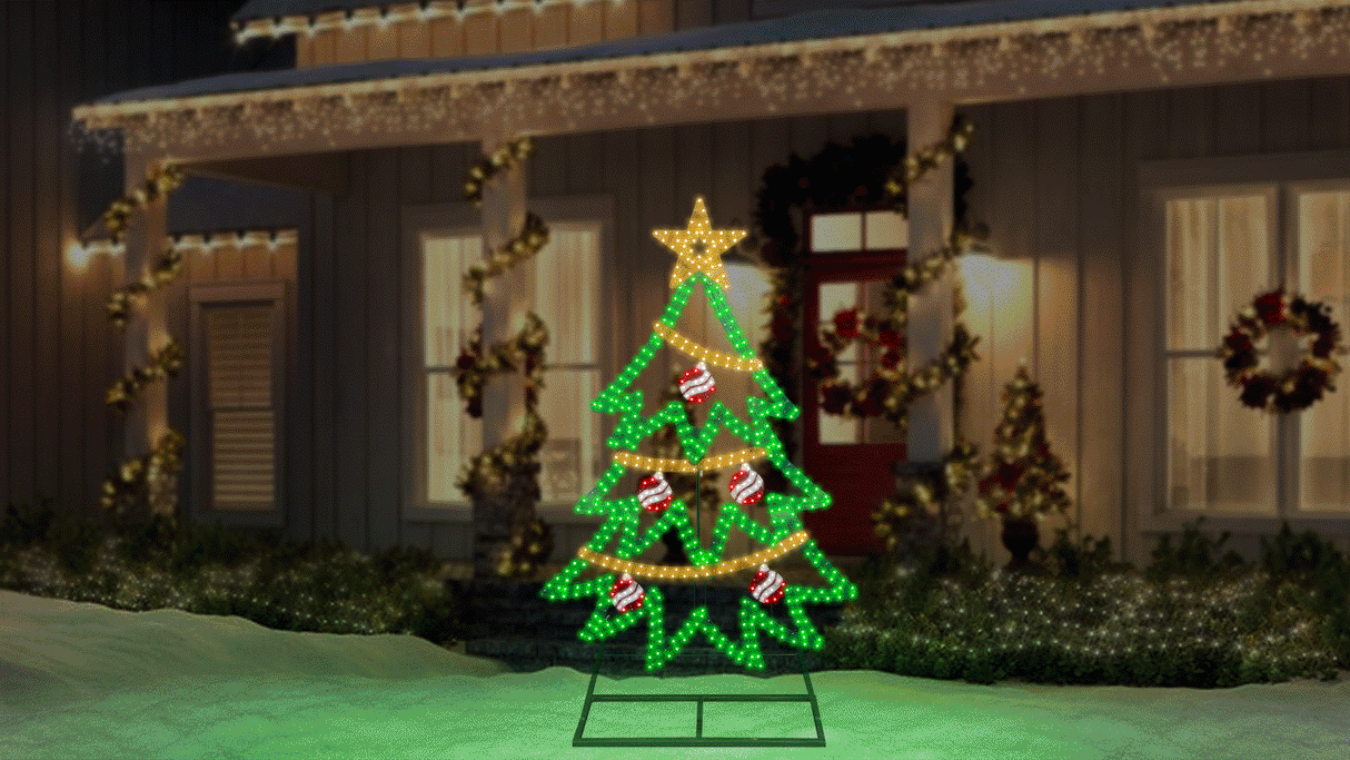 This animated image shows the twinkling tree decoration on a snowy yard in front of a house decorated for Christmas.