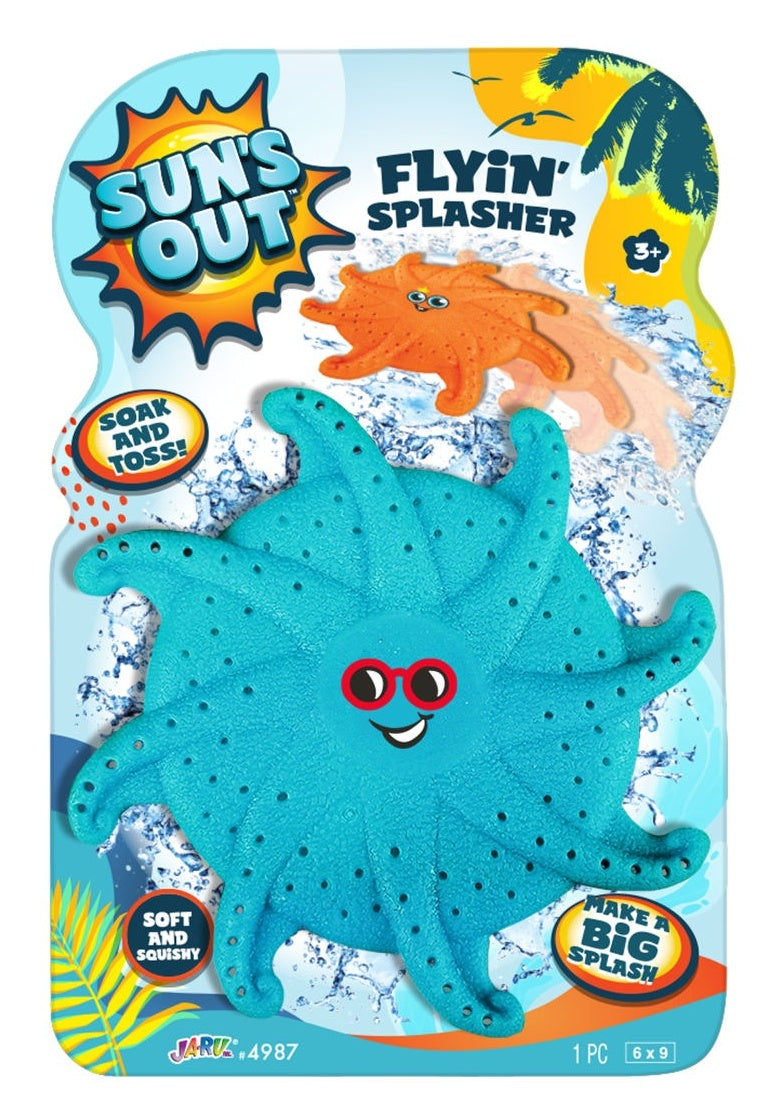 This image shows the blue color option for this flyin' splasher pool toy. The packaging reads "Sun's Out Flyin' Splasher. Soak and toss! Make a big splash! Soft and squishy." This blue option features a face in the middle. The face is wearing red sunglasses and has a sly smile.