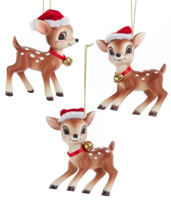Each ornament is a brown colored reindeer with white dots, bright eyes, a red collar with a golden bell and a red Santa hat. There are three different options.