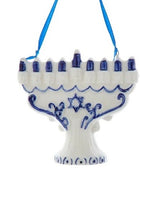 This ornament is shaped like a white menorah with blue candles.
