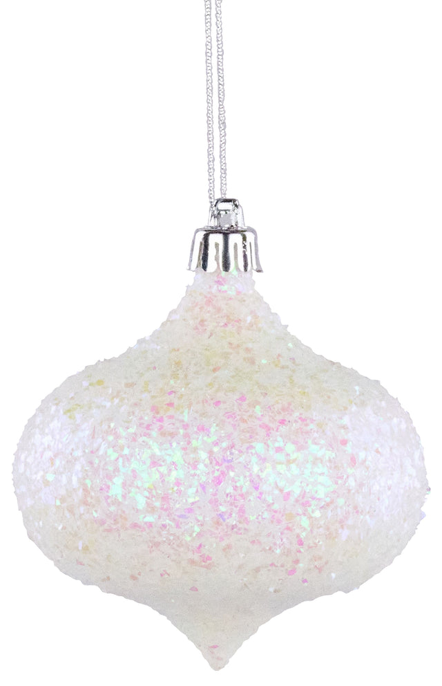 Onion shaped ornament decorated with iridescent confetti glitter. The glitter looks like it's white and pink.