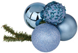 This image shows the smoke blue bauble cluster with a pine branch. One bauble is a shiny smoke blue color. One bauble is decorated with smoke blue tinsel. One bauble is decorated with smoke blue glitter. One bauble is a matte smoke blue color.