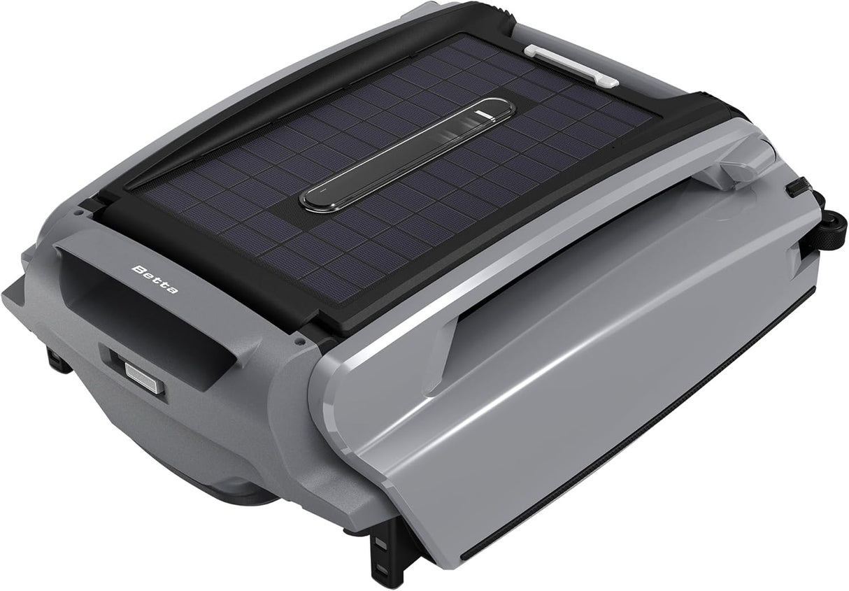This image shows the robotic pool cleaner up close on a white background. The cleaner is black and gray.
