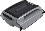 This image shows the robotic pool cleaner up close on a white background. The cleaner is black and gray.