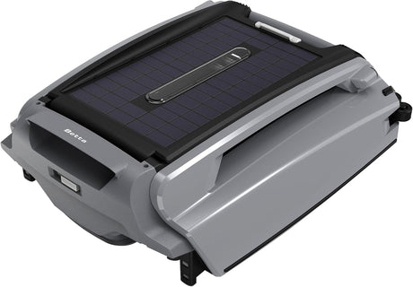 This image shows the robotic pool cleaner up close on a white background. The cleaner is black and gray.