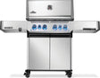 Silver and gray Napoleon grill. There is a built-in thermometer on the lid, there are two shelves outstretched, six buttons and a cabinet that opens up underneath. This is the front view.