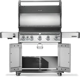 This image shows the grill with the lid open, the shelves down and the cabinet open.