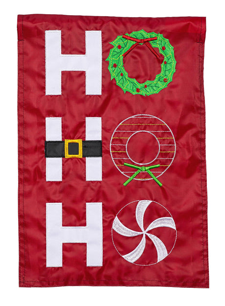 A red flag. It reads "HO HO HO." The first O is shaped like a green wreath with a red ribbon. The second H appears to be wearing Santa's belt. The second O is white and yellow striped with a green ribbon. The third O is shaped like a red and white peppermint candy.
