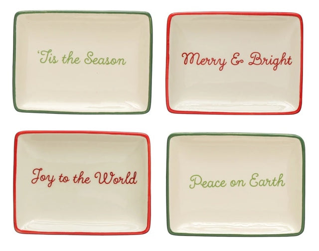 Decorative stoneware dish. One dish reads "Tis the Season" and has a green border. One dish reads "Merry & Bright" and has a red border. One dish reads "Peace on Earth" and has a green border. One dish reads "Joy to the World" and has a red border.