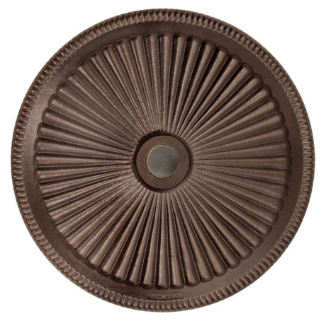 An up close view of the top of the bronze colored umbrella base.