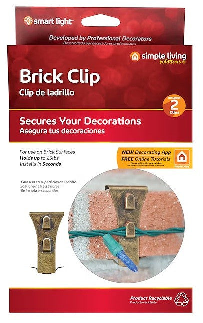 This image shows the packaging that these brick clips come in. It reads "Brick Clip. Secures your decorations. For use on brick surfaces. Holds up to 25 lbs. Installs in seconds. New decorating app. Free online tutorials."