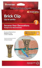This image shows the packaging that these brick clips come in. It reads "Brick Clip. Secures your decorations. For use on brick surfaces. Holds up to 25 lbs. Installs in seconds. New decorating app. Free online tutorials."