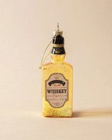 Ornament shaped like a miniature bottle of alcohol. One ornament is red and reads "Aged Brandy." One ornament is yellow and reads "Whiskey." One ornament is orange and reads "Scotch." One ornament is yellow and reads "Bourbon." One ornament is light blue and reads "Gin." Each ornament has glitter inside.