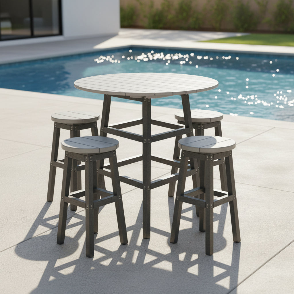This is a lifestyle image showing this counter height table surrounded by four stools on a cement patio next to an inground swimming pool.