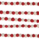 Garland made out of red and white felt balls.