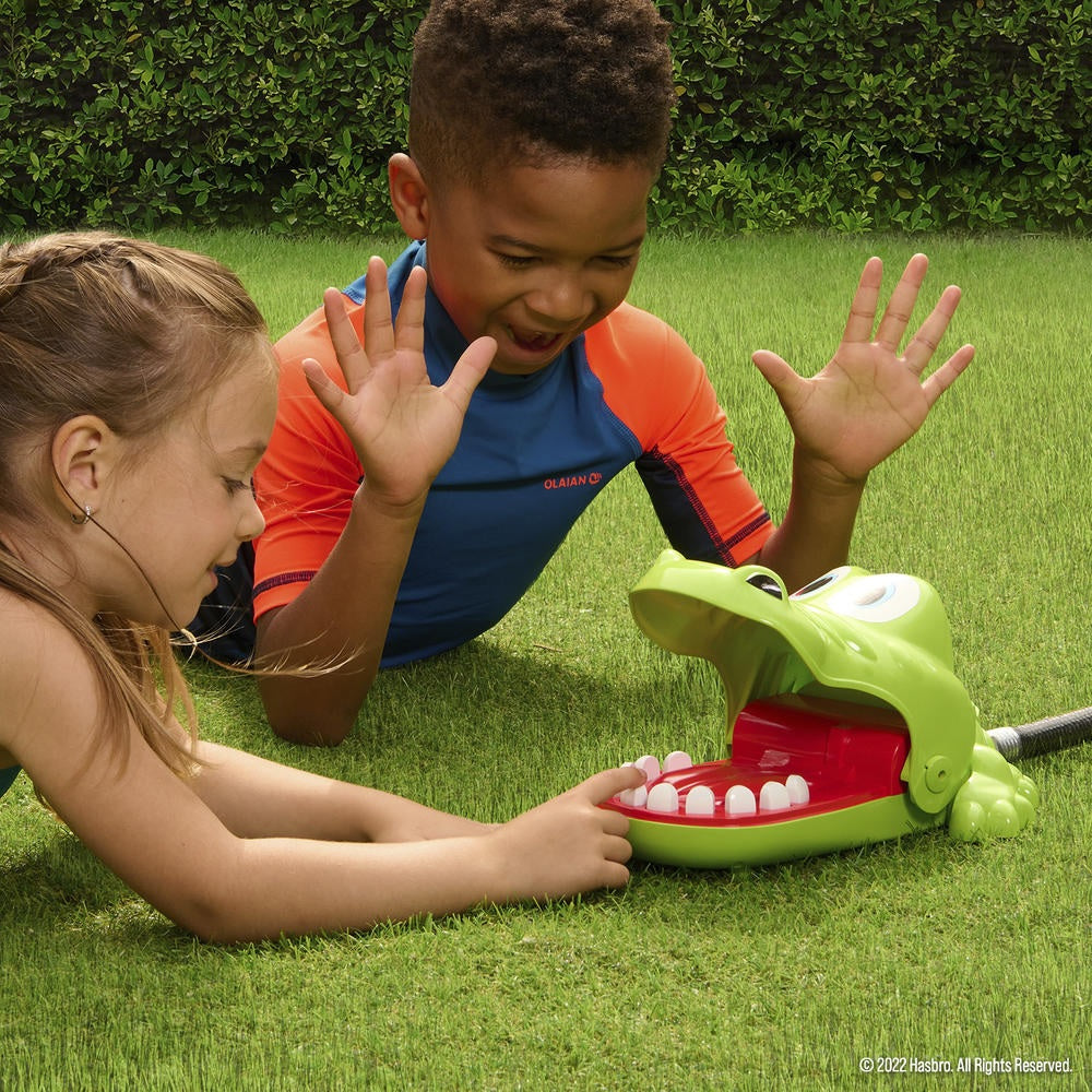A game where you choose a tooth and press down with your finger. But if the crocodile snaps down, you get chomped AND soaked!