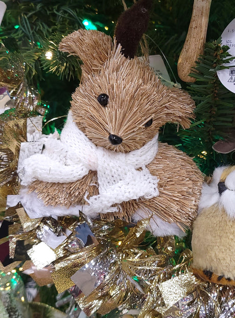 Ornament designed to look like a deer wearing a white scarf. One ornament is a deer lying down. One ornament is a deer standing up.
