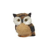 Fluffy ornament shaped like an owl. One is tan, one is brown and one is grey.