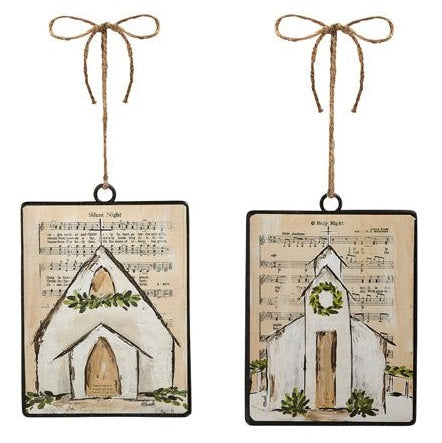 Each ornament features a background printed with sheet music; there are two options. One ornament has the sheet music for "Oh Holy Night" and a chapel with a garland at the steeple. One ornament has the sheet music for "Silent Night" and a chapel with a wreath at the steeple.