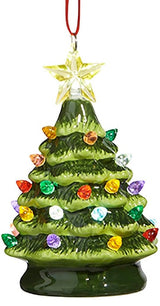 Light up Christmas decoration. Ornament shaped like a decorated tree with a star on top. Lights on the tree are multi-colored.