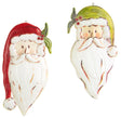Santa Claus head ornament. One is wearing a red Santa hat and one is wearing a green Santa hat.