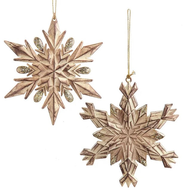 Plastic snowflake ornaments designed to look like they've been made out of distressed wood. There are two different options.