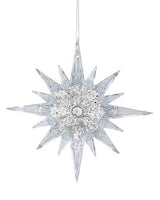 Clear ornament covered in silver glitter shaped like a snowflake with all points.