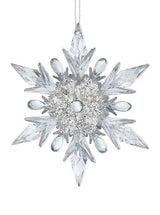 Clear ornament covered in silver glitter shaped like a snowflake with points and round points.