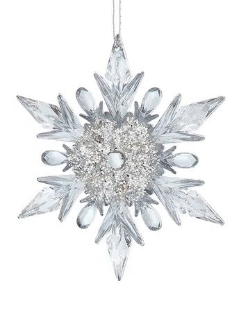 Clear ornament covered in silver glitter shaped like a snowflake with points and round points.