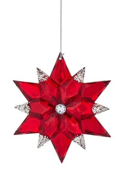 Snowflake shaped ornaments. This one is red with silver glitter and a silver gem in the center. 