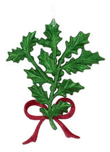 Holly leaf ornament. Sparkling green glittered holly leaf branches and berries. Accented with a vibrant red, glittered bow for added charm.