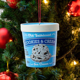 Ornaments shaped like a pint of ice cream. There are 5 options: Cookies & Cream, Strawberry, Chocolate, Vanilla or Mint Chocolate Chip. Each ornament features intricate details with a lifelike appearance, from the labels on the pint containers to the swirls of ice cream.