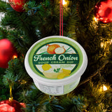 Plastic ornaments shaped like different party dips. One is a red container that reads "Classic Hummus." One is a green container that reads "French Onion Sour Cream Dip." One is a blue container that reads "Cream Cheese Spread."