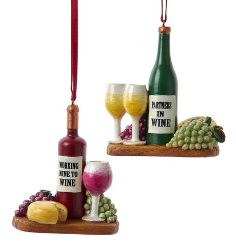 Ornament shaped like a plate with wine and cheese. One ornament features a bottle of red wine that reads "Working nine to wine." One ornament features a green bottle that reads "Partners in Wine." Each ornament features red and green grapes, wine glasses and some cheese.