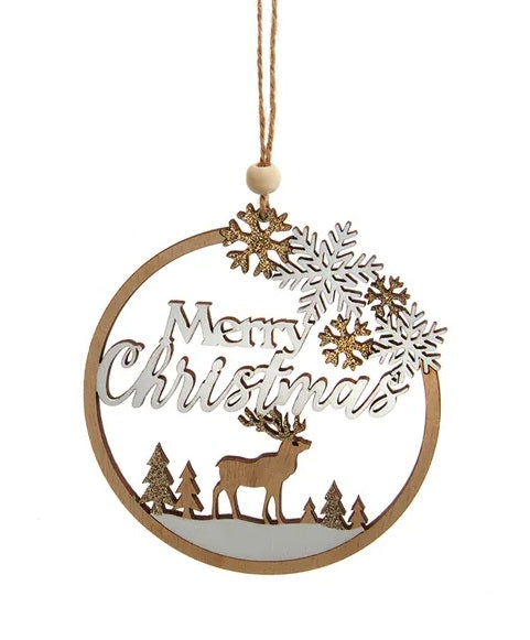 Round wooden ornament with a winter scene inside. One ornament features the silhouette of a reindeer standing in the middle of a snowy forest. One ornament features different types of snowflakes and the silhouette of a reindeer among some trees and it reads "Merry Christmas."