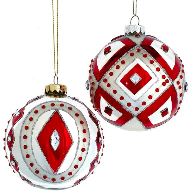 Silver glass ornament adorned with shimmering gemstones.