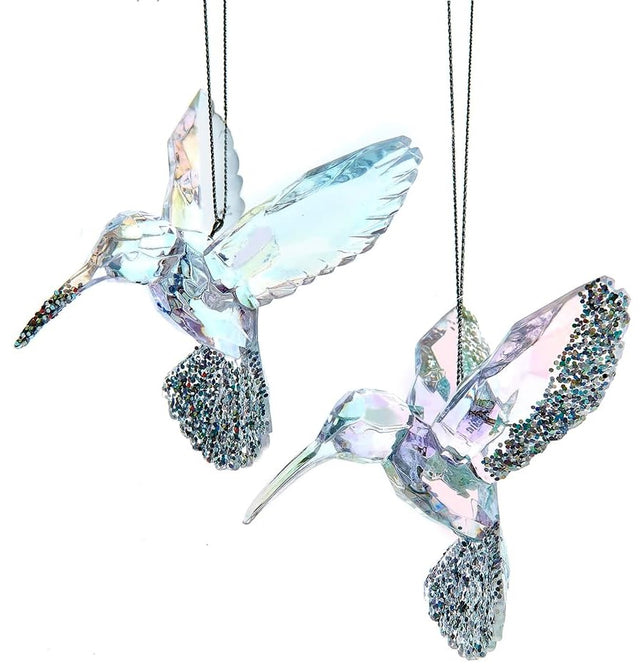 Acrylic ornament shaped like a bird. One has a blue tint and one has a pink tint. Both feature glitter accents.