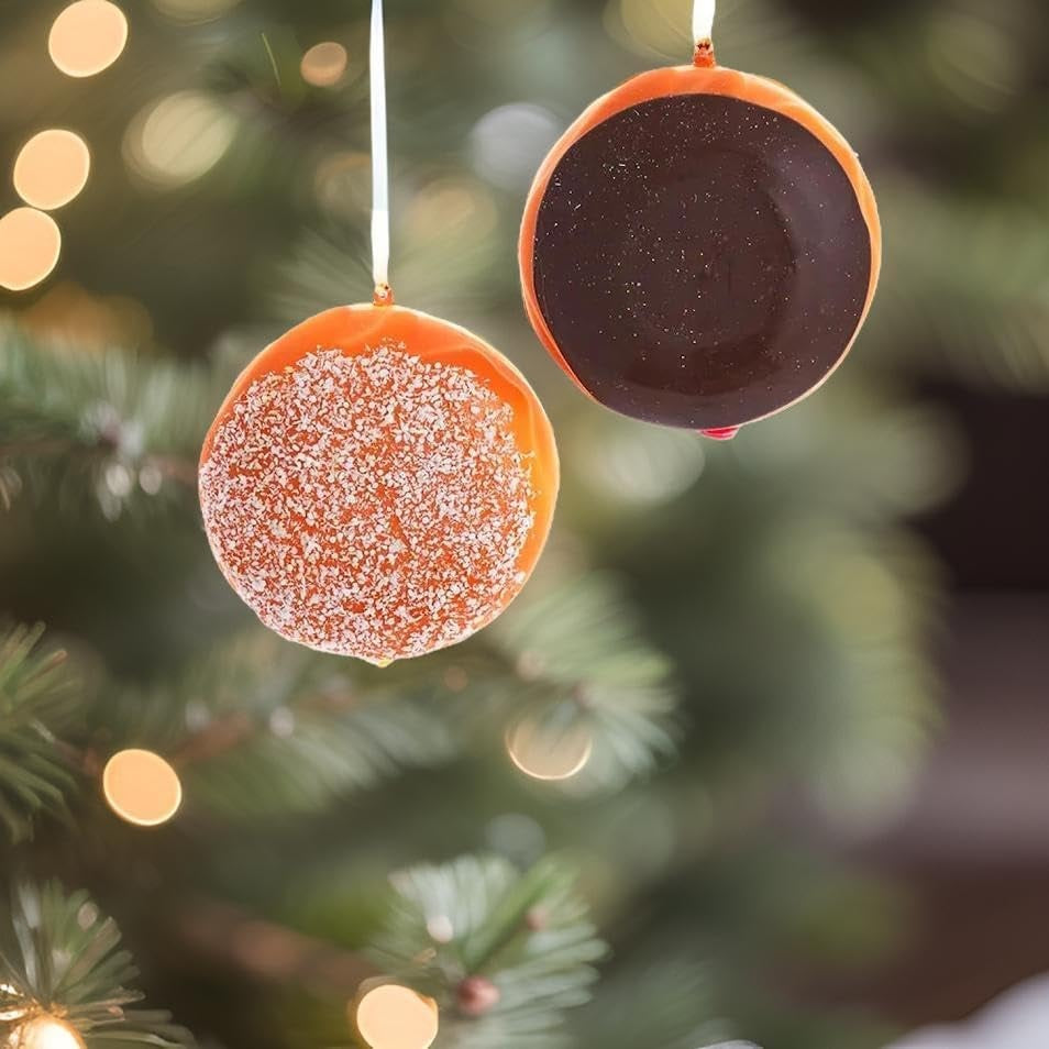 Ornament shaped like a donut. One ornament is decorated with white flecks to look like sugar. The other ornament is decorated with chocolate frosting.