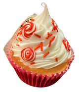 Christmas ornaments shaped like cupcakes with different colored frosting and candies on them.