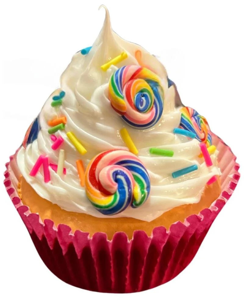 Christmas ornaments shaped like cupcakes with different colored frosting and candies on them.